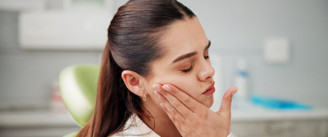 woman with mouth pain
