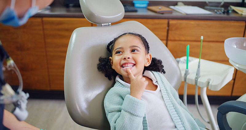 young girl visiting the dentist
