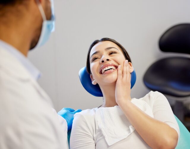 woman smiling after dental appointment