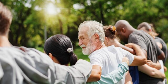 man with community members
