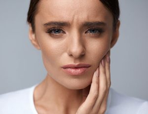 woman with mouth pain