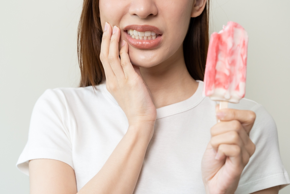 woman with tooth sensitivty